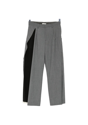 Undercover raw-edge panelled trousers - Grey
