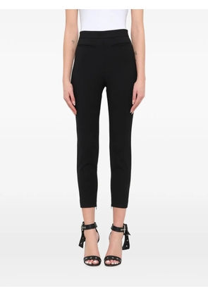 Alexander McQueen cropped zipped-hem trousers - Black