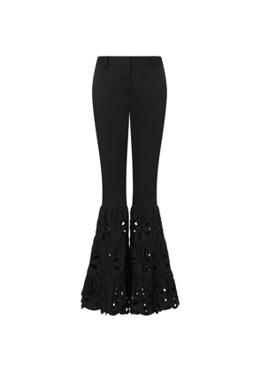 Moschino broderie-anglaise tiered-hem trousers - Black