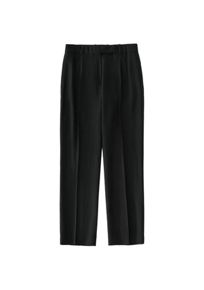 Studio Nicholson Quarte pin-tuck tailored trousers - Black