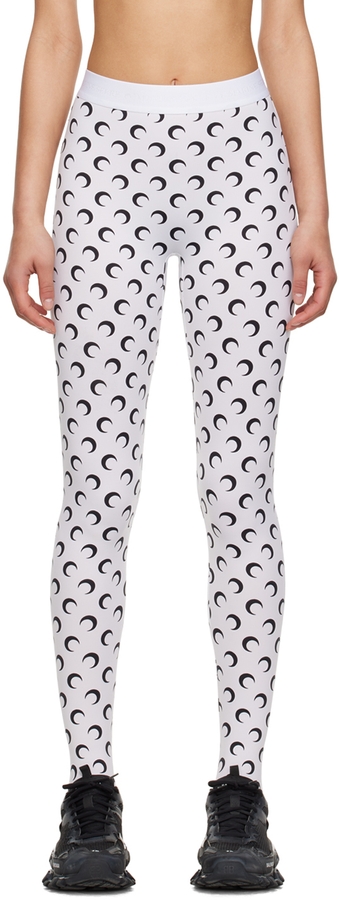 https://cdn-images.milanstyle.com/fit-in/630x900/filters:quality(100)/spree/images/attachments/011/492/652/original/marine-serre-white-fuseaux-moon-leggings-ssense-photo.jpg